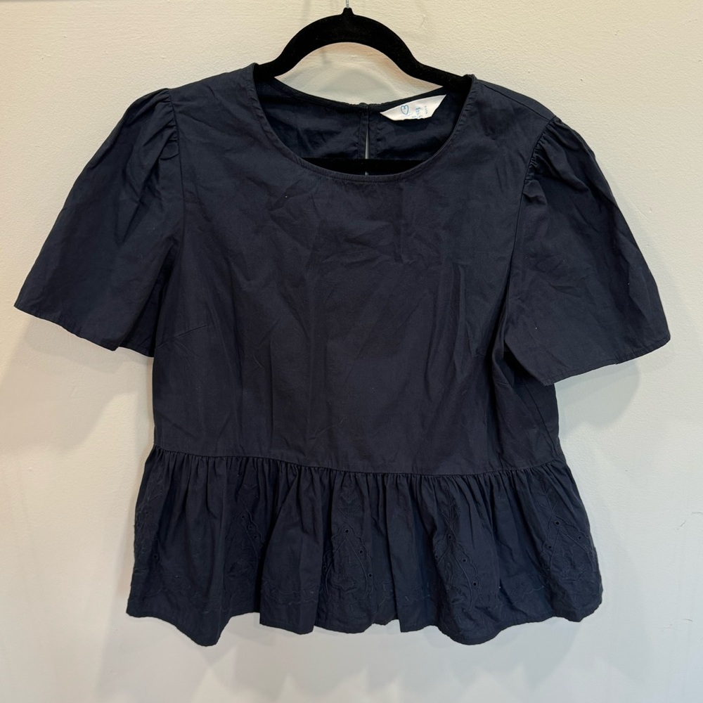 Peplum eyelet top